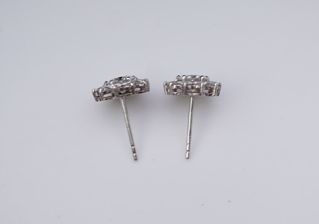 A pair of diamond earrings